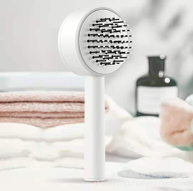 Liora-Brosse à Cheveux Autonettoyante