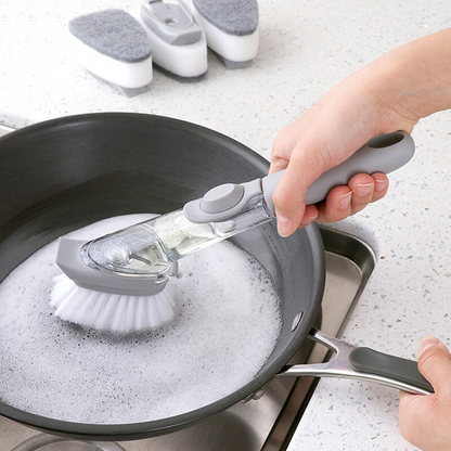 Brosse de nettoyage avec distributeur de savon